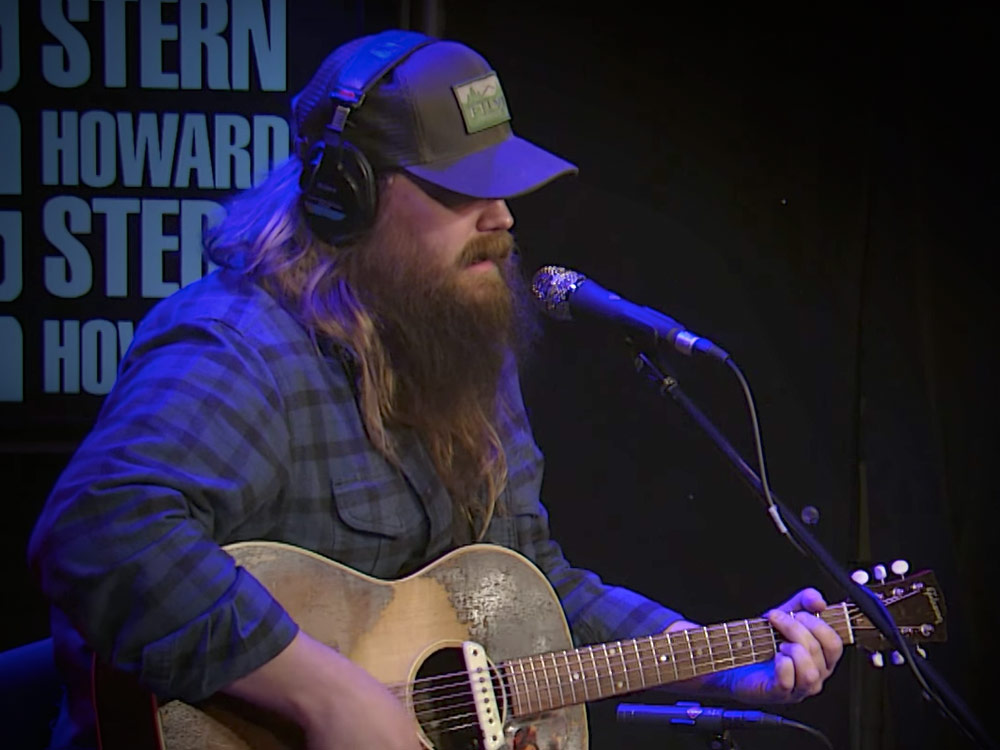 Hijinks Ensue as Chris Stapleton Performs “Broken Halo” & Talks New Album With Howard Stern [Watch]